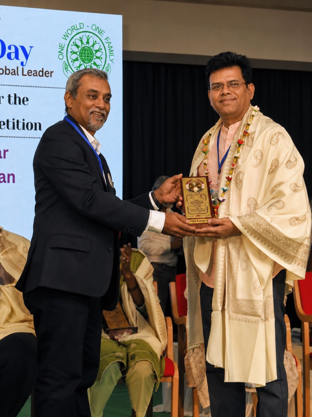 Vinit Kumar Singh being felicitated for serving as a judge at World Family Day 2026 in Bengaluru